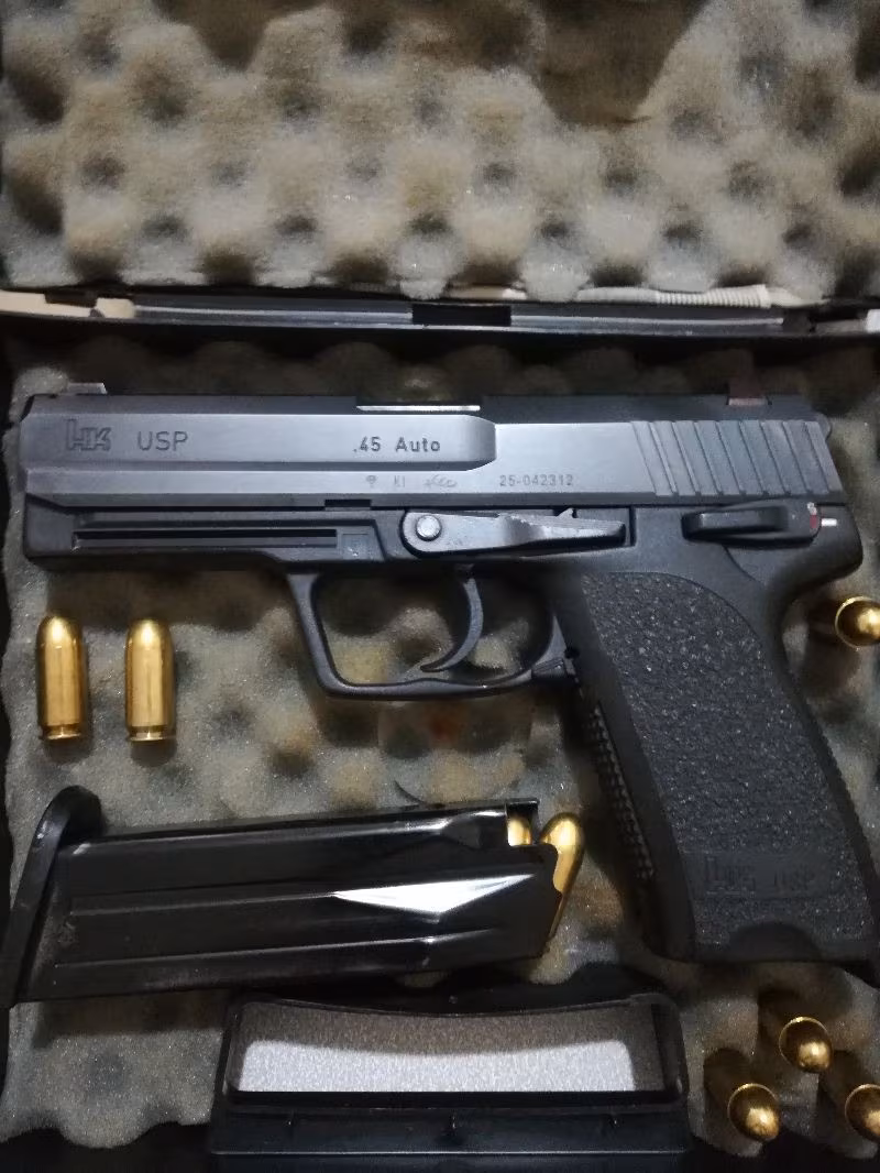 H&K 45 CAL.